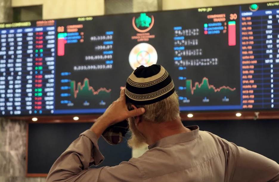 A Pakistani stockbroker monitors the latest share prices during a trading session at the Pakistan Stock Exchange in Karachi, Pakistan, on Feb. 10. The sluggish performance of the market was attributed to the delay in concluding the ninth review of a $7 billion US dollar IMF loan program.<span class=copyright>Rehan Khan—EPA-EFE/Shutterstock</span>