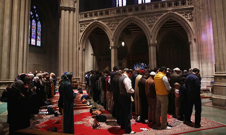 Muslims participate in a Friday prayer November 14, 2014 at the National Cathedral in Washington, DC.—AFP