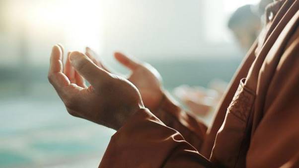 Close-up of hands clapping  Description automatically generated