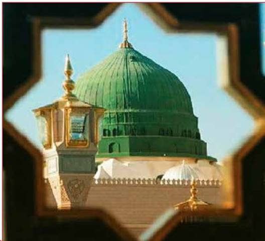 A green dome with gold trim  Description automatically generated