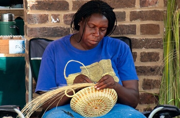 A person sitting in a chair knitting  AI-generated content may be incorrect.