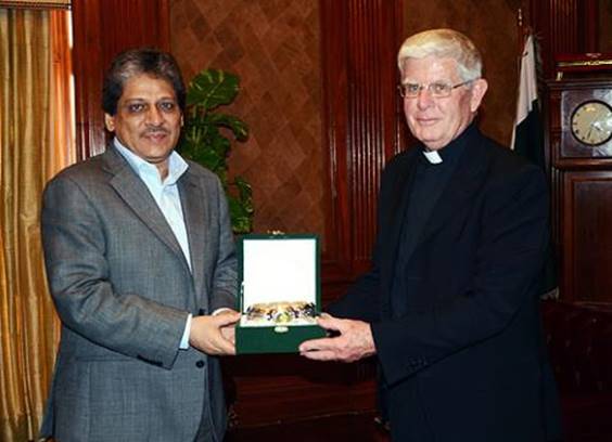 Dr. Ishratul Ebad Khan, former governor of Sindh, Pakistan, pictured with Columban Fr. Robert McCulloch (Courtesy of Robert McCulloch)