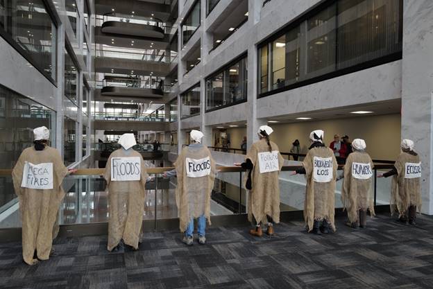 Several people wearing white caps and white hats  Description automatically generated with medium confidence