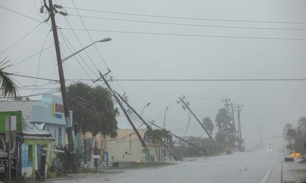 Broken utility poles downed by strong wind gusts are seen as Hurricane Milton approaches Fort Myers, Florida, US on Oct 9, 2024. — Reuters