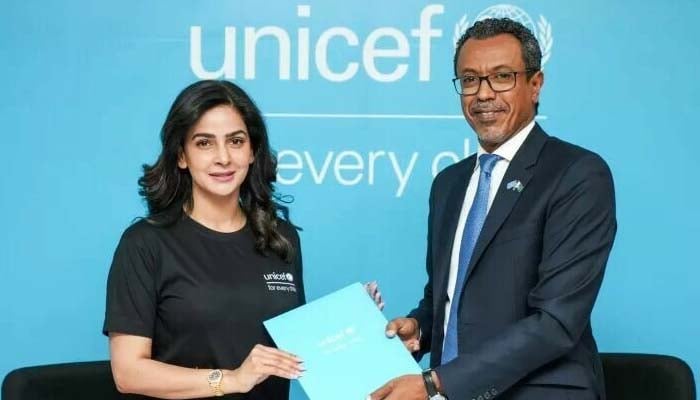 Actor Saba Qamar receives a certificate after her appointment as National Ambassador for Child Rights in Pakistan from the funds country representative Abdullah Fadil on Thursday. —Unicef