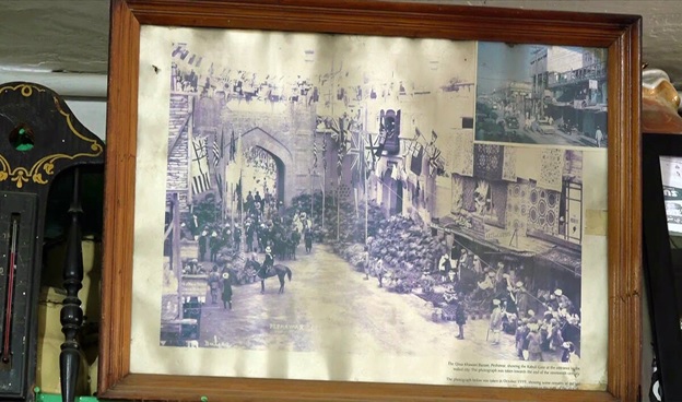 A framed picture of a street  AI-generated content may be incorrect.