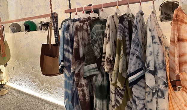 A rack of clothes on a wall  AI-generated content may be incorrect.