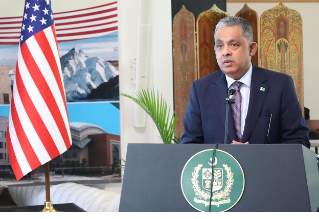 A person standing at a podium  AI-generated content may be incorrect.