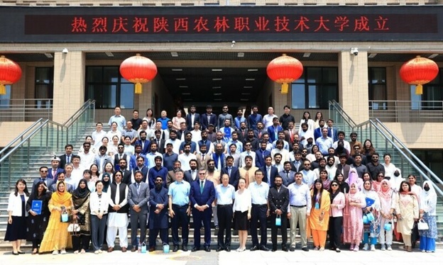 Pakistani agricultural graduates pose for a group photo after completing their training in China&rsquo;s Shaanxi province on July 18. &mdash; X/@CMShehbaz