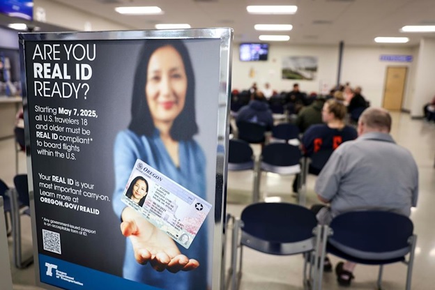 The South Salem DMV assists people on Friday, April 25, 2025 in Salem, Ore. Starting May 7, Oregon residents 18 years and older must have a REAL ID-compliant driver's license, permit or ID card or other form of TSA-approved identification to fly domestically.