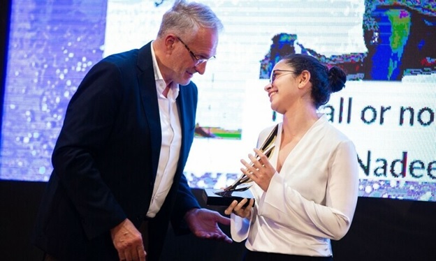 Dawn employee Anushe Engineer receives her prize in the ‘Young Reporters Writing’ category for the International Sport Press Association’s 2024 AIPS Sport Media Awards in Rabat, Morocco on Tuesday. — AIPS