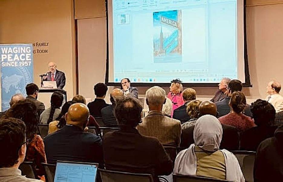 A person giving a presentation to a group of people  AI-generated content may be incorrect.