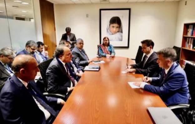 A group of people sitting around a table  AI-generated content may be incorrect.