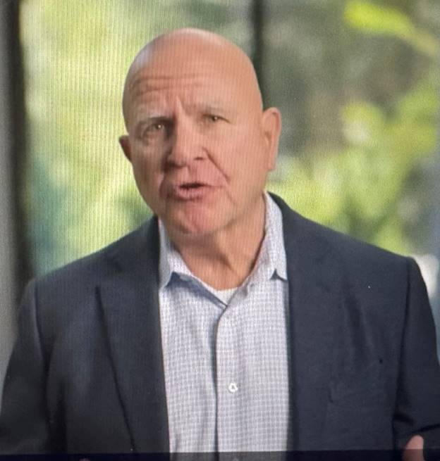 A person in a suit  AI-generated content may be incorrect.