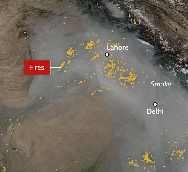 A satellite view of smoke and fire  Description automatically generated